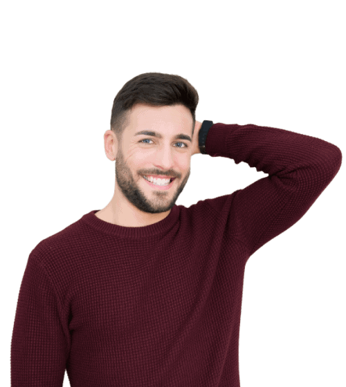 Smiling man in maroon sweater posing casually.