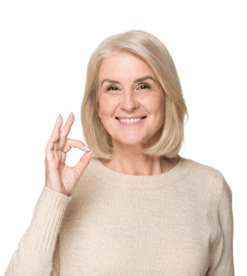 Mature woman smiling making OK hand sign