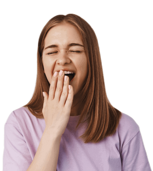 Woman yawning, tired, plain background.